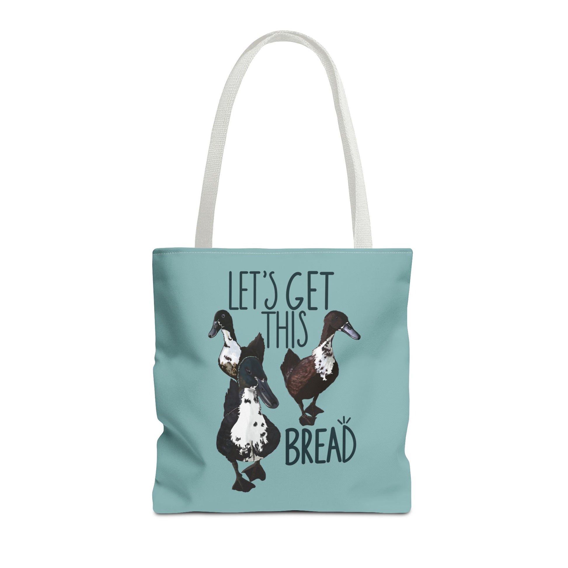 Close-up view of the 'Let’s Get This Bread' tote bag, showcasing the detailed bread illustration and vibrant text design on durable canvas material.