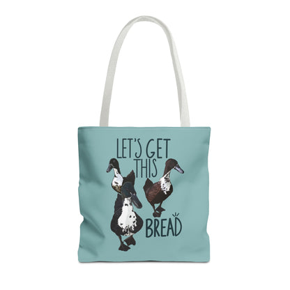 Close-up view of the 'Let’s Get This Bread' tote bag, showcasing the detailed bread illustration and vibrant text design on durable canvas material.