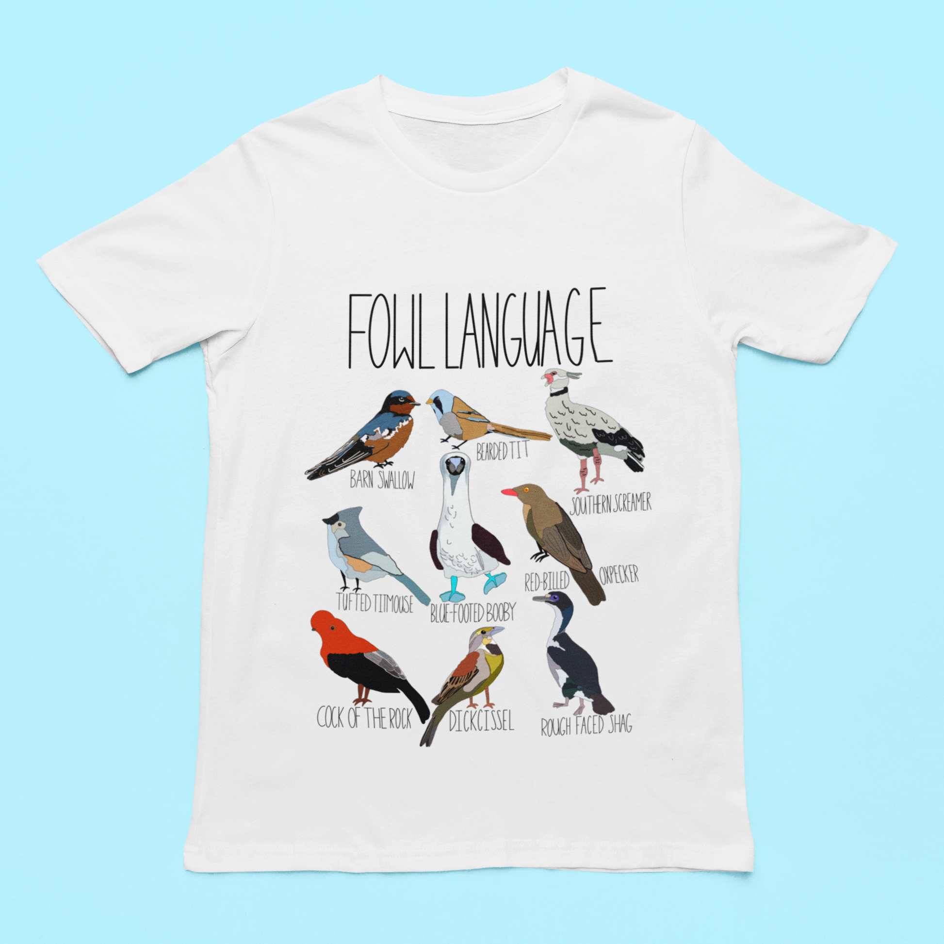 Flat lay of the 'Fowl Language' t-shirt featuring playful bird pun illustrations and typography, displayed on a colorful background for a bold statement.