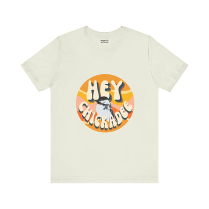 Front view of the 'Hey Chickadee' t-shirt in citron, showcasing the retro design and vibrant chickadee illustration on a clean white background.