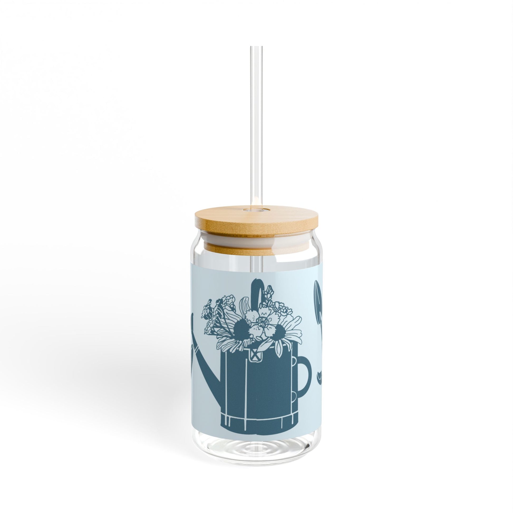 Side view of the 'Hoeing Ain't Easy' glass tumbler, showing bold typography and garden tool illustrations, displayed on a white background.