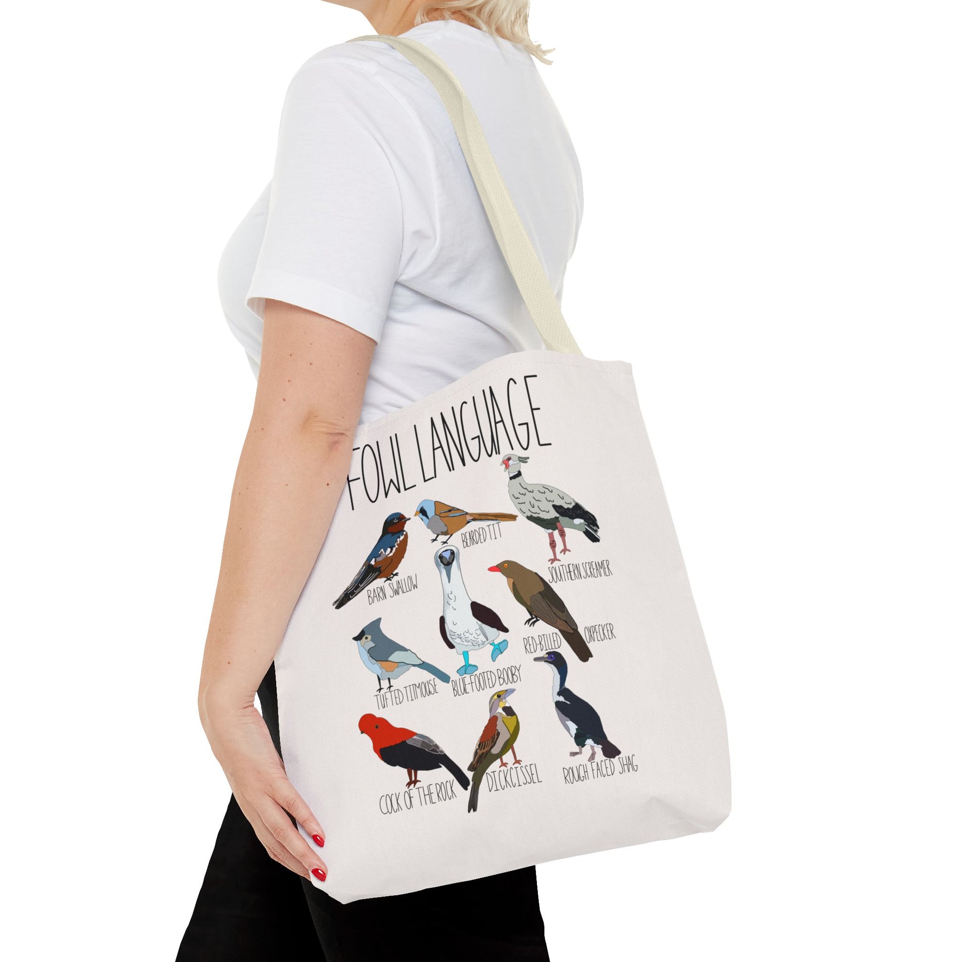 close up of  canvas tote bag featuring the playful 'Fowl Language' design with illustrations of birds like the blue-footed booby and dickcissel. Displayed on a light background, perfect for bird lovers and pun enthusiasts