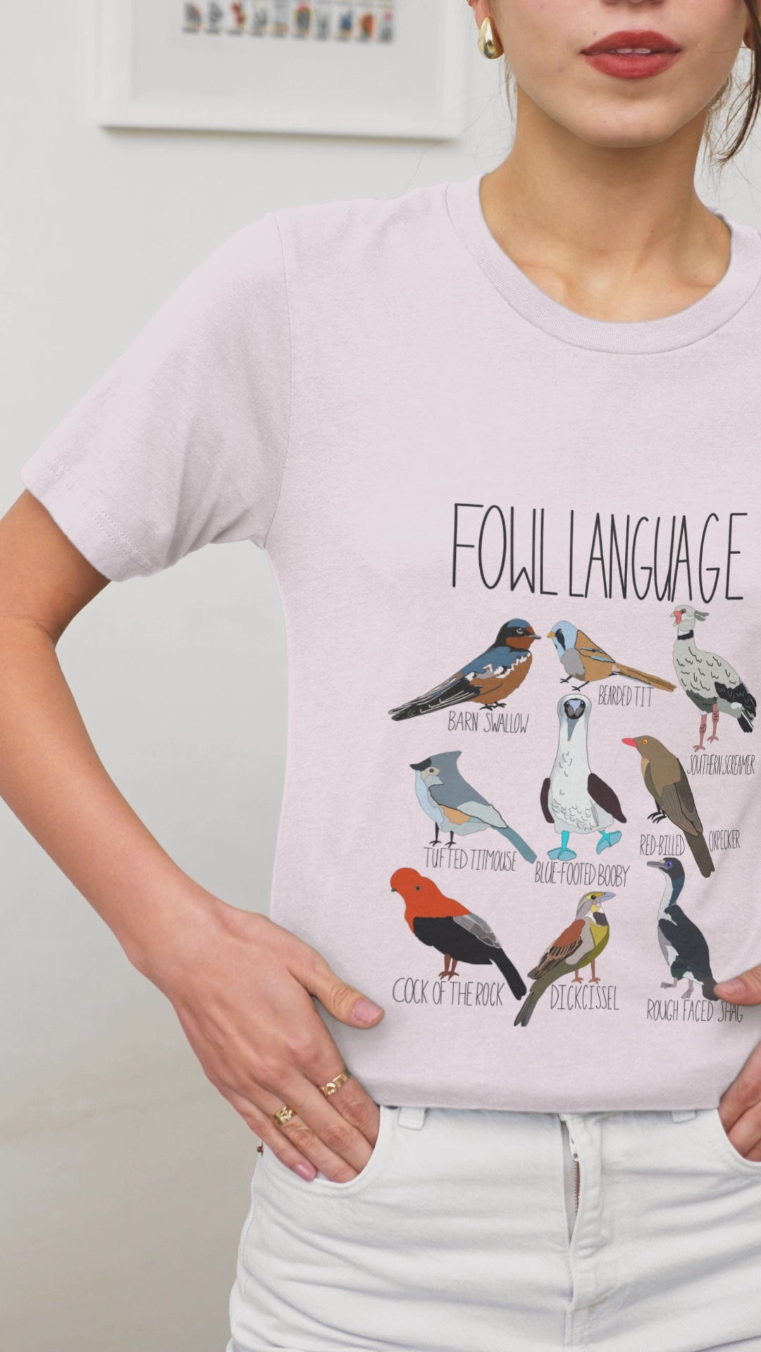 Close-up of the 'Fowl Language' t-shirt design, highlighting the bold text and vibrant bird illustrations on soft cotton fabric